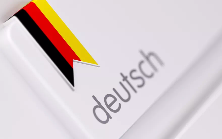 flaga niemiec i napis deutsch